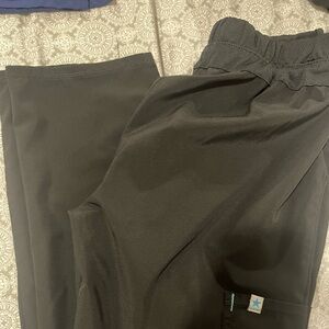 Black straight legged scrub pants